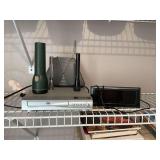 Magnavox DVD player, Midland weather radio, and Onn Clock and a few flashlights