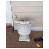 Concrete flower pot 16 1/2” x 20” has been filled with concrete as shown