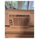 Midea air conditioning window unit. Working condition 16 inches wide by 11 inches tall.