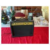 A set of media speakers and a Lynx AGL 40 amp