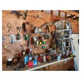Group of miscellaneous on wall and countertop, including paint -Helmet not included