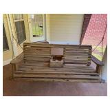 Wooden Porch swing with a cupholder￼ 63” x 27” seat height is 20 inches cupholder can be put down or folded up