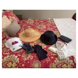 Group of accessories to include an ￼￼ Ole Miss hat, MK hat and glove set and a fossil leather wallet