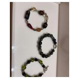 Three beaded bracelets