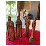 Set of four resin figurines 14 inches tall the head on one wisemen has been glued as shown