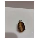 Brown faceted oval pendant
