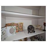 Shelf of decor. Stationary letter holder, 50th anniversary porcelain picture holder, freedom plate by the Bradford exchange. And more, see all photos.