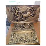 Mid century Neo-Classical relief wall plaques features a dynamic mythological scene of a figure driving a four-horse chariot (quadriga), mythological scene from [Homer's Iliad where King Priam begs Ac