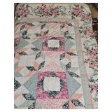 Hand quilted quilt. 84x96 in.