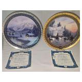 Two Thomas Kinkade collector plates. 'Olympic Mountain Evening' by the Bradford Exchange 2002 and 'Victorian Christmas' by The Bradford Exchange 2000. Both with certificates of authenticity and in ori
