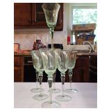 Set of 7 vintage Block Crystal 'Stockholm Melody' green hand-blown water or wine goblets featuring an optic design with trapped air bubbles in the bowl.