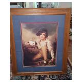 Framed print of Sir Henry Raeburn’s famous 1814 portrait painting, 'Boy and Rabbit'. 19.25 x 23.5 in tall.