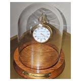 Hummel 'Ring Around The Rosie' pocket watch with gold color case in glass dome display case. Needs new battery.