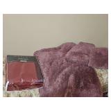 King size soft and fluffy comforter with two king size shams and a decorative pillow. Also includes a king size burgundy martex blanket.
