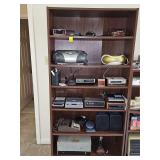 Laminate six shelf bookcase.  Four of the shelves are adjustable. 36 x 12 x 72 in tall. Contents are NOT included.