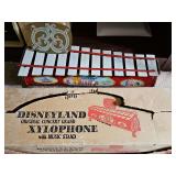 Vintage 1950s-60s Tudor Metal Products 'Disneyland Original Concert Grand' xylophone toy with original box. Middle C and D keys are loose, missing mallet.