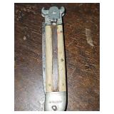Springer lever lock automatic knife, manufactured in Solingen, Germany, during the 1950s or 1960s. Notch at the top indicates this model was designed to function as a shell puller for shotgun ammuniti