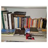 Grouping of miscellaneous hardback books, paperback books, including Bibles, hymnal, various genres.