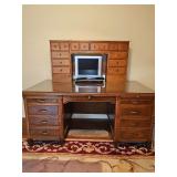 8 drawer desk with protective glass top 65x35.25x 31 in tall (no key) with 10 drawer hutch  48 x 9.5 x 25.5 in tall. Includes contents in drawers. Does NOT include monitor or keyboard.