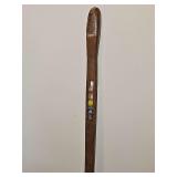 Walking stick with 5 caged marbles. Very unique. 34.5 in tall.