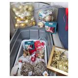 Container of Christmas decor and ornaments.