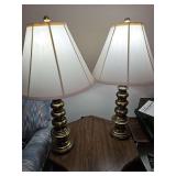 Two brass lamps. 31 in tall.