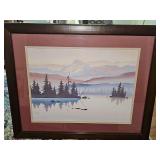 Framed pastel and watercolor landscape print features a serene mountain lake scene with silhouetted evergreen trees and soft pink hues by artist T.Chim(?) 22 x 18.5 in tall.