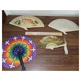 Three vintage/antique fans and one paper folding fan.