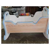 Doll rocking cradle. 19.5x 13.5 x 12 in tall.