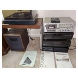 Stereo components and speakers. Teac CX-350 stereo cassette deck, Techniques stereo cassette deck RS-TR272, Techniques rotary disc changer system, Kenwood multiple disc changer player, turntable, and 