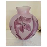 Beautiful lavender vase with textured lilies painted on vase. 10 in tall.