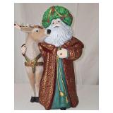 Beautiful ceramic Santa with reindeer. Very ornate coat. 14 in tall.
