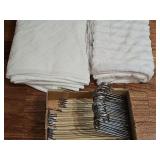 Two minky fleece throws and a grouping of trouser hangers.
