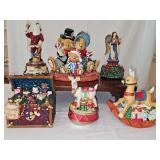 Six music boxes. All in working condition.