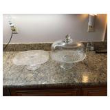 12 inch footed covered glass cake stand, and a footed 11 1/2 in.² stand