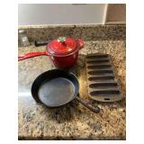 8 inch cast-iron skillet, cast-iron corn muffin pan and a one and three-quarter quart LECREUSET red cast iron enamel pot