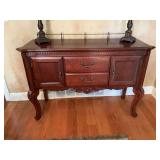 Beautifully detailed cherry buffet with brass back rail. 54 1/2” x 19 1/2” x 40” Contents not included