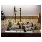 2- 14 inch brass candle holders plus 4-10 1/2 inch brass candle topper and a 6 inch vase￼