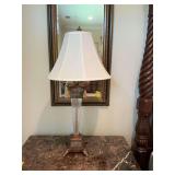 Ornate column lamp. Clear fluted glass column with ornate bronze toned base and top. 34 inches.