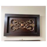 Resin wall hanging in black and bronze with red undertones. 24” x 15”