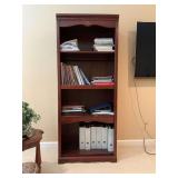 Wood bookcase measuring 30” x 17” x 74” contents not included