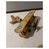 ￼ Metal Biplane, yellow military, World War I style airplane