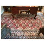 Persian wool rug in red blues and cream. Excellent condition 90” x 128”.