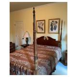 Queen size cherry four poster bed with spindle footboard.