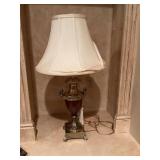 Very pretty brass and brown 30 inch lamp. Does need a new shade.