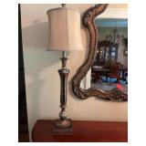 8 inch Black and gold lamp with a 6 1/2 in.² base