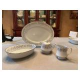 Four piece serving set of Noritake Contemporary fine China. Blythe pattern.. Cream and sugar bowl, 9 1/2 inch vegetable bowl and a 13 1/2 inch platter.