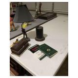 Assortment of items, including a metal 18 inch golf lamp, and two golf books. Lamp does need new shade