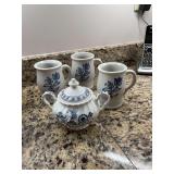 Three Pfaltzgraff vintage stoneware Yorktown mugs , and a Bblue Norick blue onion sugar bowl.