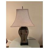 Green and brown ceramic 36 inch table lamp. The bottom shade is 18 in.²